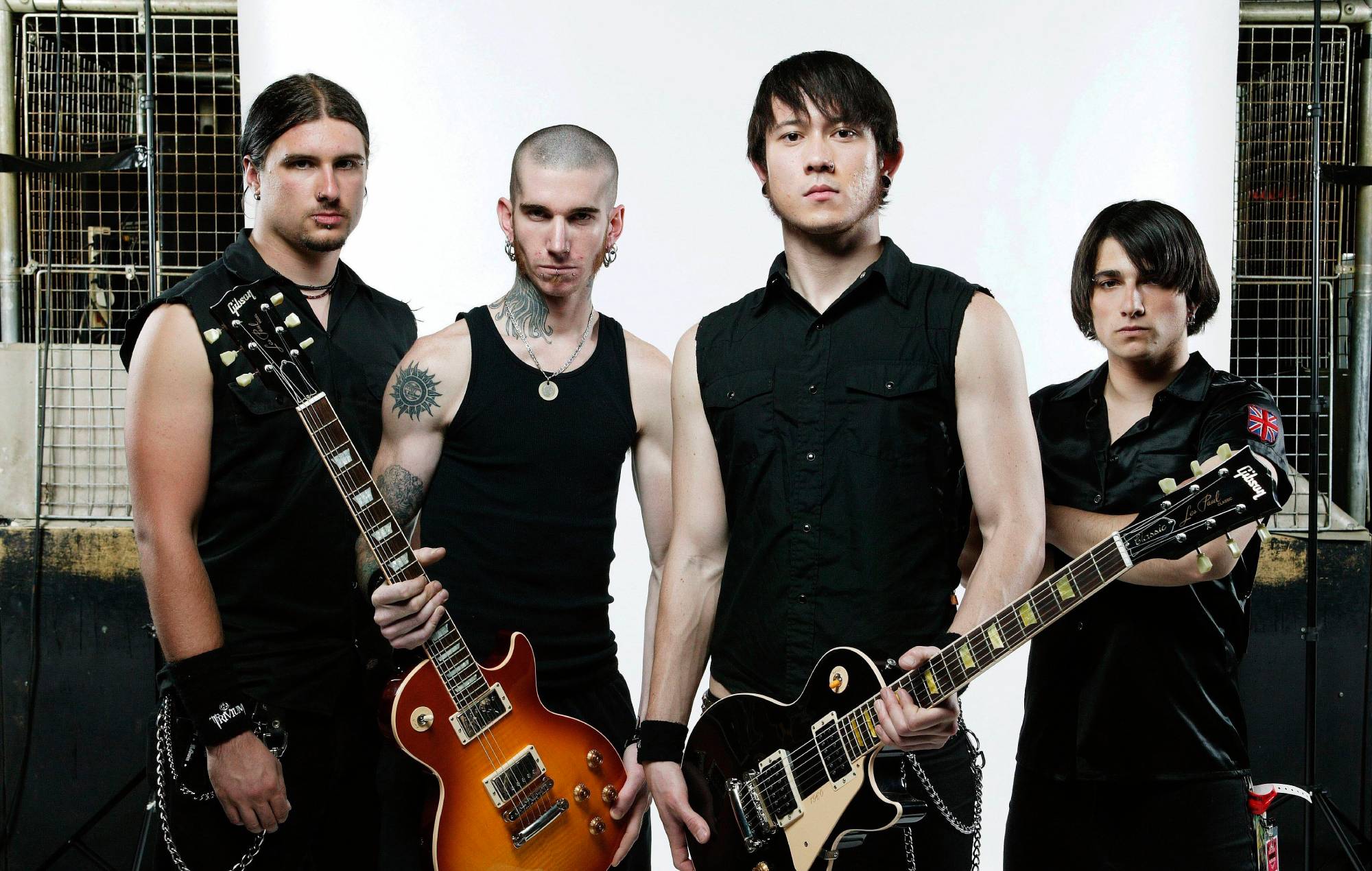 Photo of Matt HEAFY and Corey BEAULIEU and TRIVIUM and Travis SMITH and Paulo GREGOLETTO; L-R: Corey Beaulieu, Travis Smith, Matt Heafy, Paulo Gregoletto - posed, group shot, studio (Photo by Mick Hutson/Redferns)