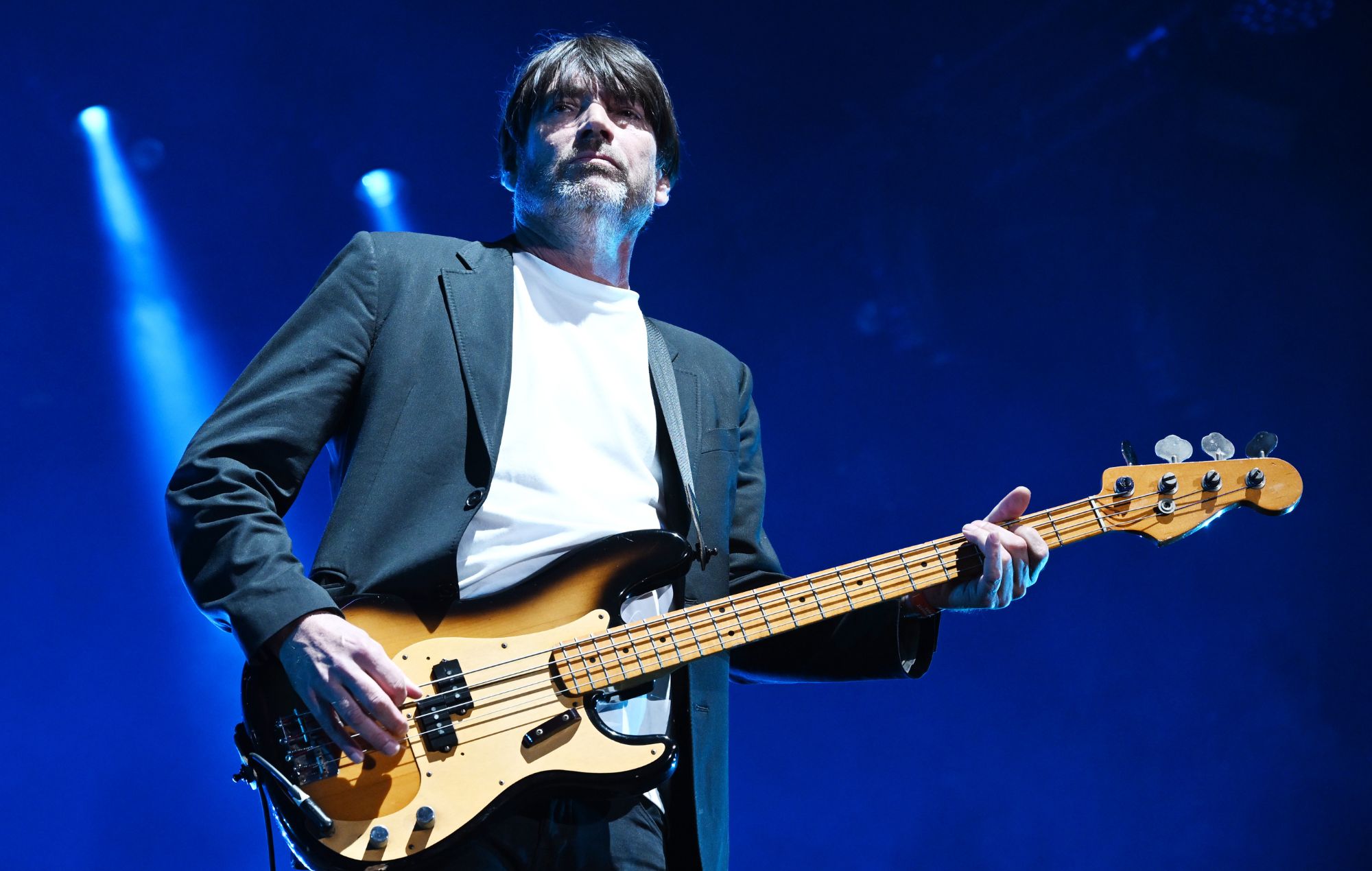 Alex James performs with Blur on day 3 of Roskilde Festival 2023