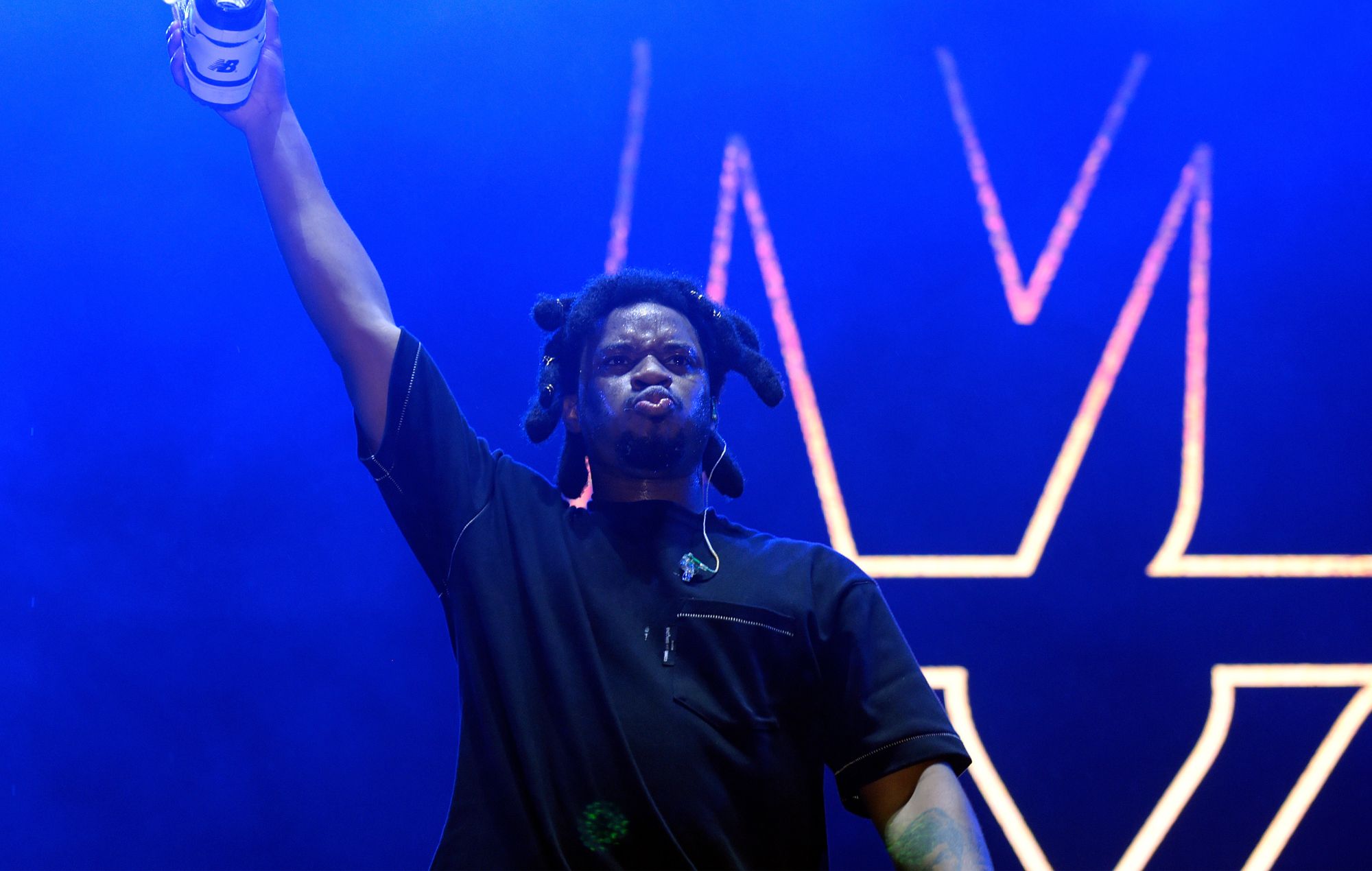 Denzel Curry performs on stage 