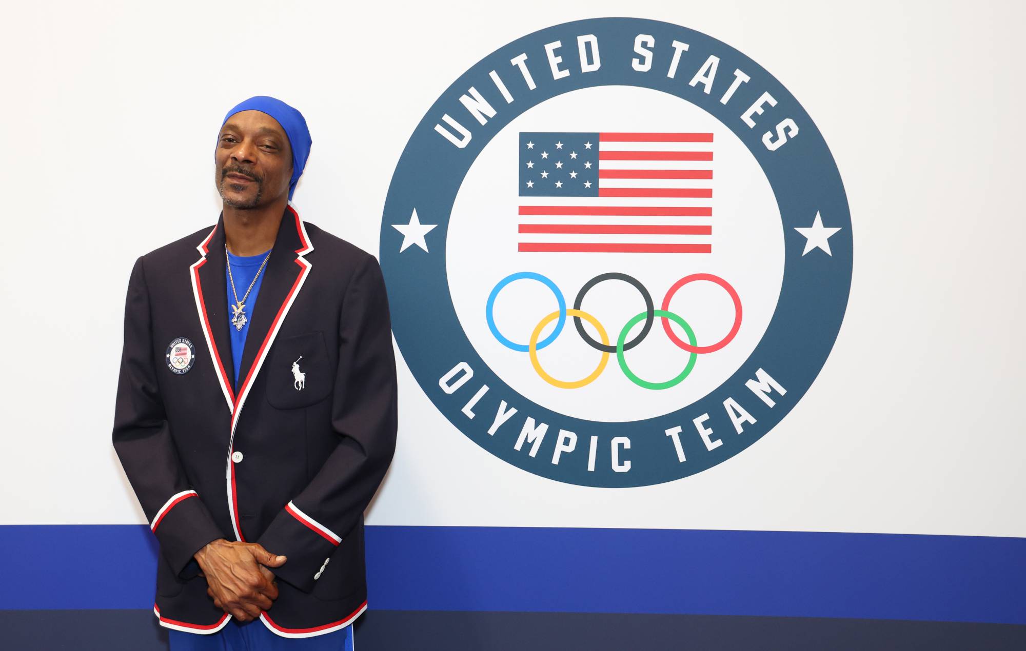 Snoop Dogg tries on clothes during Team USA Welcome Experience ahead of Paris 2024 Summer Olympics at Polo Ralph Lauren on July 21, 2024 in Paris, France. (Photo by Joe Scarnici/Getty Images for USOPC)